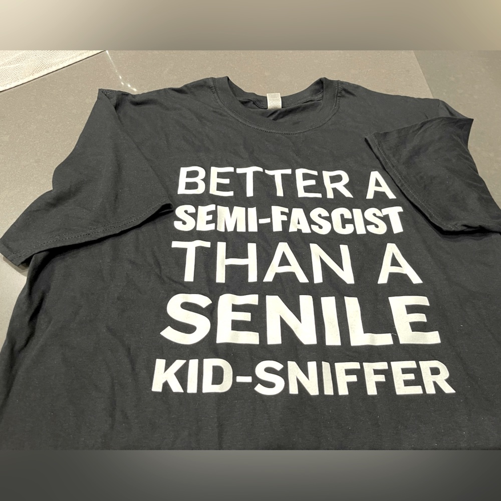 NWOT Men’s Softstyle TShirt w/Slogan by Gildan. Size XL. Black w/White Letters.